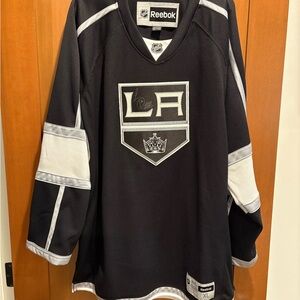 Reebok Black and White LA Kings Jersey signed by Luc Robitaille